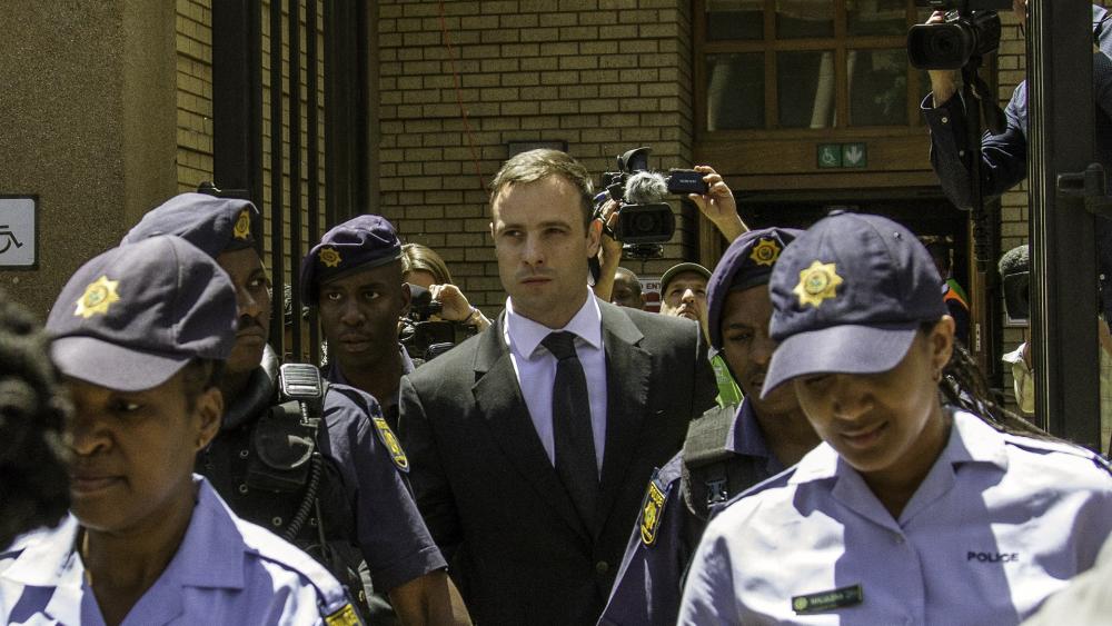 Oscar Pistorius leaving court