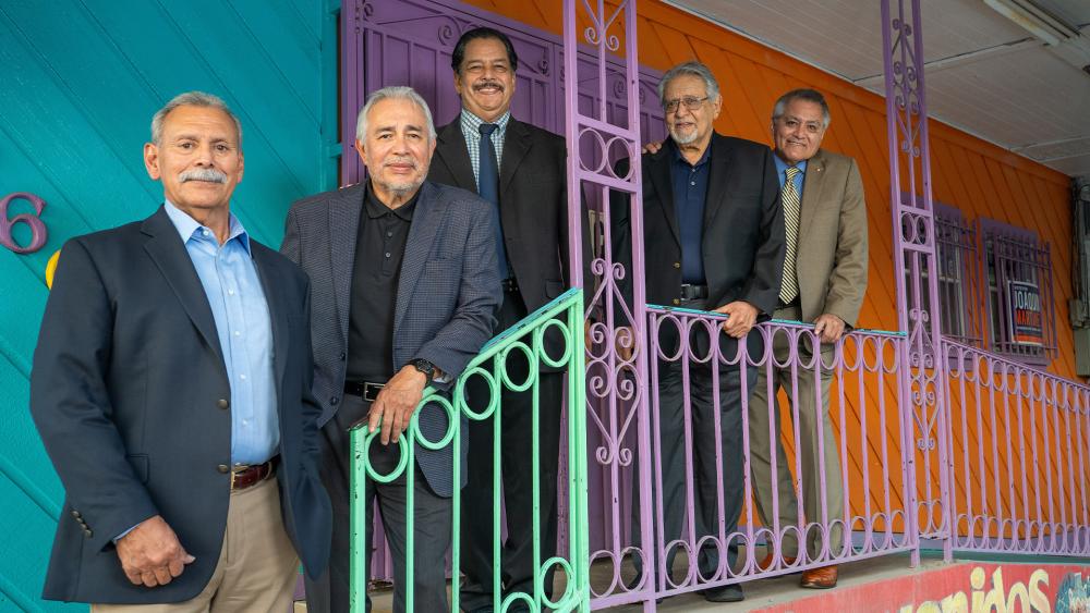 Members of the Chicano Squad pose together in the 21st century