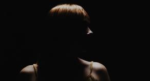A woman in silhouette