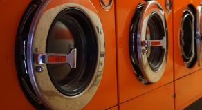 A row of washing machines in a launderette