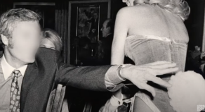 An unidentified man attempts to grab for a Playboy Bunny