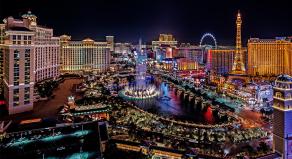An elevated nighttime panoramic view of the colourful LAs Vegas skyline