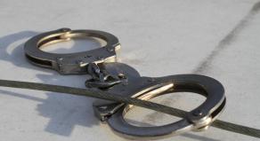 A photograph of police handcuffs