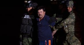 El Chapo apprehended by two Mexican soldiers in camouflage gear