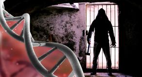A stock image showing a DNA string and a person holding a sledgehammer