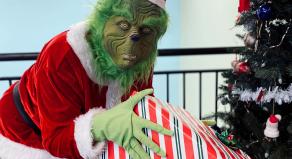 The Grinch stealing a Christmas present