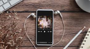 A smartphone playing a true crime podcast