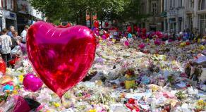 Flowers, teddies & balloons fill St. Ann's Square in Manchester