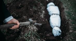 Burying a body in a shallow grave