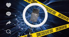 A graphic showing a broken mobile phone surrounded by police tape
