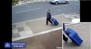 CCTV footage of Jemma Mitchell dragging a large blue suitcase