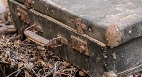 A rusty old suitcase