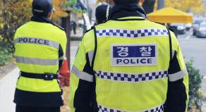Three South Korean policemen on patrol