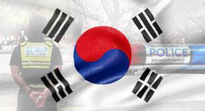 South Korean flag overlayed with an image of local police