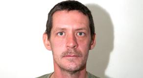 A photograph of killer Mark Brown