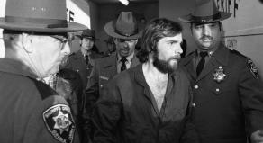 Ronald DeFeo Jr. is led away by police after a court hearing