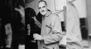 Peter Moore in the projection room of a movie theatre