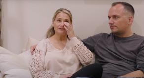 Gypsy Rose Blanchard crying on a sofa with Ken Urker's arm around her