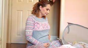 Gypsy Rose Blanchard cradles her stomach to mark her pregnancy