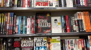 A section for true crime books in a bookshop