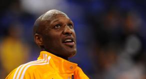 NBA star Lamar Odom wearing a LA Lakers tracksuit jacket