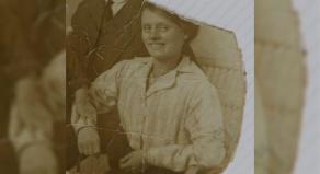 Black and white torn photograph of Louisa Dunne when she was believed to be in her late twenties