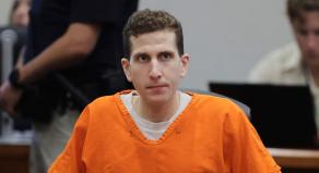 Bryan Kohberger sits in an orange prison jumpsuit during his sentencing hearing