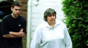 Primrose Shipman outside her house with her son David