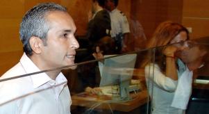 Suspect Mohammed M'Barek and his sister Jamila stand at the start of his trial in a Nice courthouse