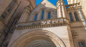 The Whitworth Building - a grand building with a sign reading 'UNIVERSITY OF MANCHESTER' on the front