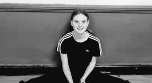 A black and white photo of Holly Newton