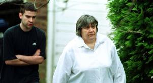 Primrose Shipman outside her house with her son David