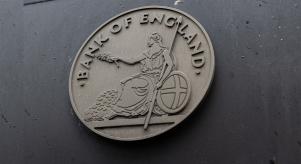 Bank of England crest on the side of a building