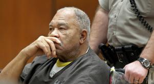 Samuel Little sitting in a wheelchair in court
