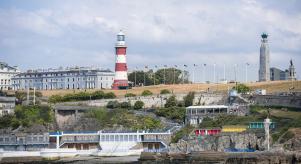 Plymouth Hoe with lighthouse, war memorial, Georgian architecture, bathing huts and Art Deco lido.