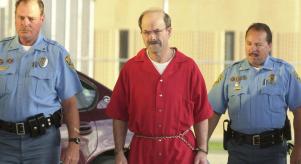 Dennis Rader escorted by deputies into a correctional facility in Kansas, United States