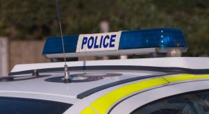 Blue lights on top of a police car