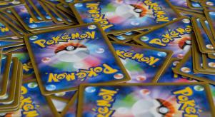 A large number of Pokemon cards spread out face down