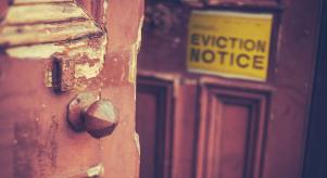 An eviction notice on an old door