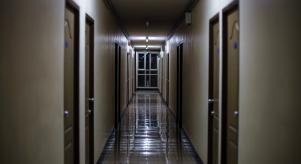 A dark dormitory corridor