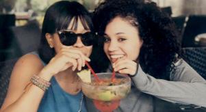 Desiree Gibbon sharing a large cocktail with her mother