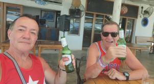 Paul Longworth and Albert Alfonso drinking beers together on holiday
