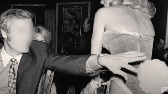 An unidentified man attempts to grab for a Playboy Bunny