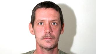 A photograph of killer Mark Brown
