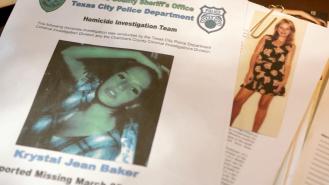 A missing poster for Krystal Jean Baker lies on top of her case file
