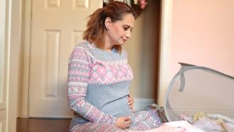 Gypsy Rose Blanchard cradles her stomach to mark her pregnancy