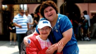 Dee Dee Blanchard smiles for a photo with Gypsy Rose who is sitting in a wheelchair