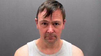 David Roustoby's police mugshot