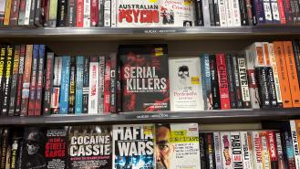 A section for true crime books in a bookshop