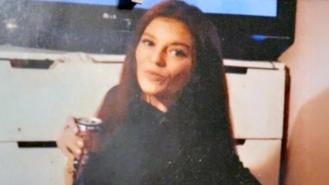 Sarah Henshaw posing in a personal photo with a can in her hand